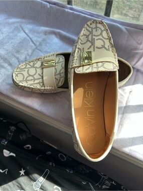 Calvin Klein Cream Logo-Print Loafers with Gold Buckle